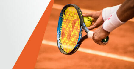 Hands of a Tennis Player Preparing to Serve