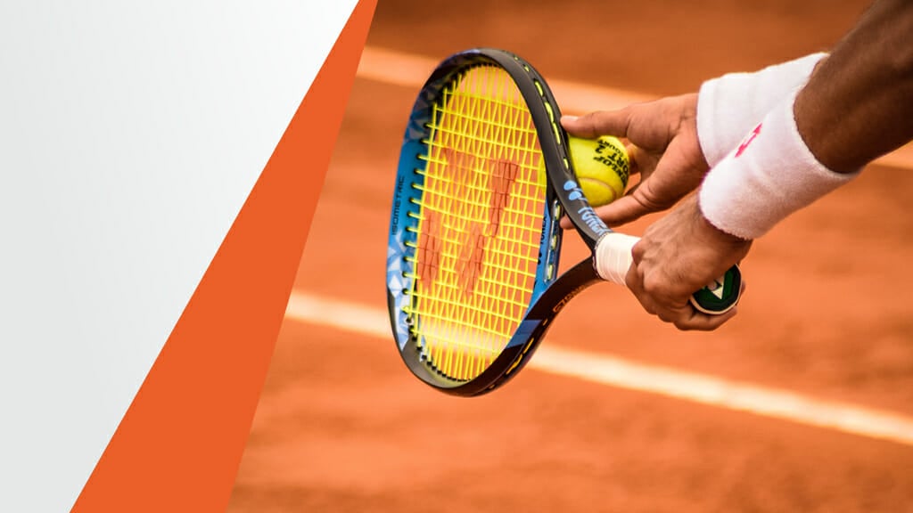 Hands of a Tennis Player Preparing to Serve