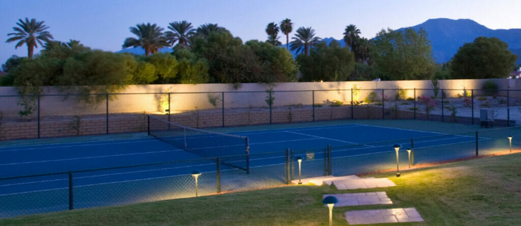 Tennis Court in the Evening with Lights Turned on